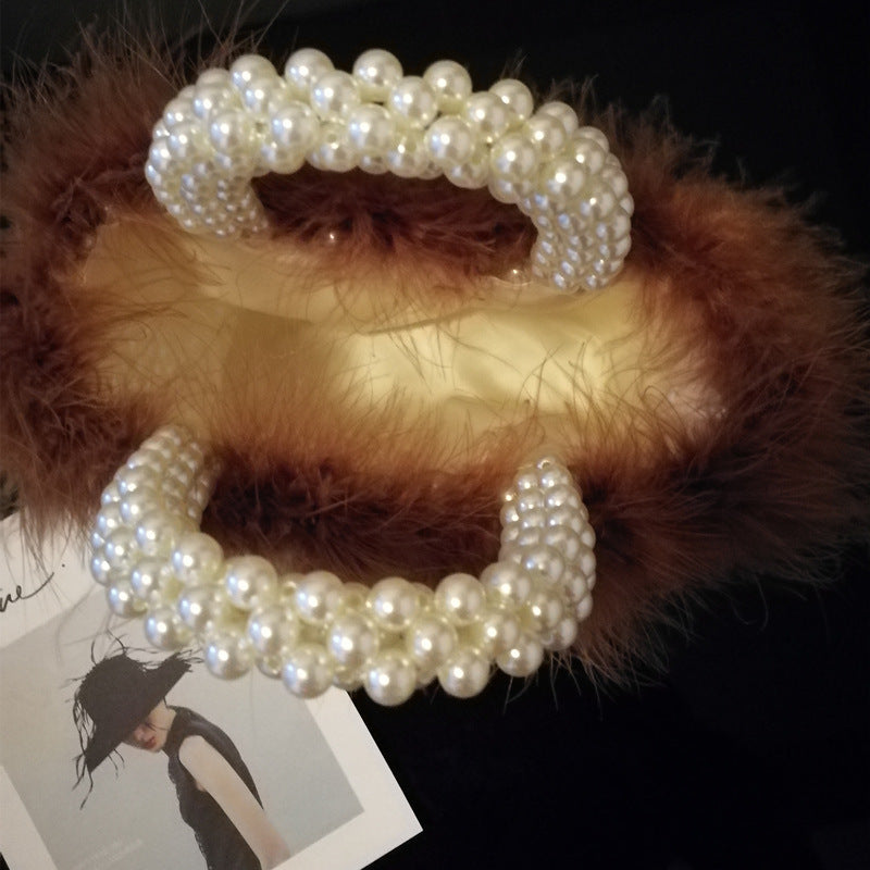 Hand-woven wool and beaded pearl bag