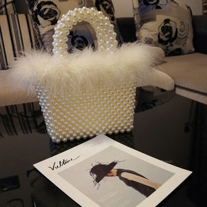 Hand-woven wool and beaded pearl bag